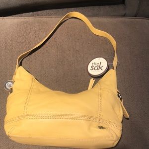 The Sak yellow handbag